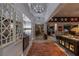 Open hallway with decorative lighting and a stylish rug at 8713 Long Winter Ct, Las Vegas, NV 89131