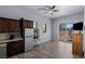 Bright kitchenette boasting stainless steel appliances and convenient access to the outdoors at 8713 Long Winter Ct, Las Vegas, NV 89131