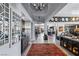 Open-concept living room featuring high ceilings, elegant decor, and seamless indoor-outdoor flow at 8713 Long Winter Ct, Las Vegas, NV 89131