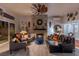 Inviting living room featuring a fireplace and modern decor at 8713 Long Winter Ct, Las Vegas, NV 89131