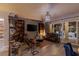 Relaxing living room area featuring a wall mounted TV and glass doors at 8713 Long Winter Ct, Las Vegas, NV 89131