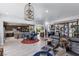 Gourmet kitchen and living area with custom finishes and stylish accents throughout at 8713 Long Winter Ct, Las Vegas, NV 89131