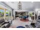 Expansive open concept with gourmet kitchen, living area, and access to the backyard at 8713 Long Winter Ct, Las Vegas, NV 89131
