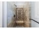 Luxurious shower with decorative tile work and bench at 8713 Long Winter Ct, Las Vegas, NV 89131