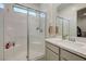 Bathroom featuring a glass shower, a white subway tile wall, and a single-sink vanity at 912 Allister Fields Ln, Las Vegas, NV 89138