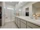 Clean and bright bathroom with a glass-enclosed shower and double sink vanity at 912 Allister Fields Ln, Las Vegas, NV 89138