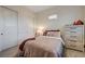 Bedroom featuring carpet, closet and natural light at 912 Allister Fields Ln, Las Vegas, NV 89138