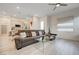 Modern living room featuring stylish furniture, open concept layout, and plenty of natural light at 912 Allister Fields Ln, Las Vegas, NV 89138