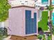 Aerial view of the home's roof fitted with solar panels, and an inviting backyard area with a pergola at 9628 Matanzas Creek Ct, Las Vegas, NV 89139