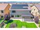 Expansive backyard features a patio with a pergola and a green lawn, ideal for outdoor relaxation at 9628 Matanzas Creek Ct, Las Vegas, NV 89139