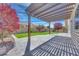 Inviting backyard with a covered patio and well-maintained landscaping at 9628 Matanzas Creek Ct, Las Vegas, NV 89139
