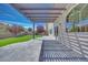 Landscaped backyard with a shaded patio perfect for outdoor enjoyment at 9628 Matanzas Creek Ct, Las Vegas, NV 89139