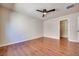 This bedroom features wood floors and a spacious closet at 9628 Matanzas Creek Ct, Las Vegas, NV 89139