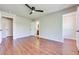Bedroom with laminate wood floors and access to a bathroom and a closet at 9628 Matanzas Creek Ct, Las Vegas, NV 89139