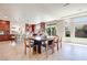 Dining room flows into the kitchen with ample natural light and outdoor views, creating an inviting space at 9628 Matanzas Creek Ct, Las Vegas, NV 89139