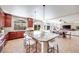 Spacious open kitchen with a large center island, seating, and modern appliances at 9628 Matanzas Creek Ct, Las Vegas, NV 89139