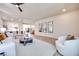 Bright living room with comfortable seating, neutral decor, and an open layout ideal for entertaining at 9628 Matanzas Creek Ct, Las Vegas, NV 89139