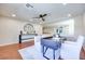 Office area featuring a modern desk, white chairs, and bright lighting at 9628 Matanzas Creek Ct, Las Vegas, NV 89139