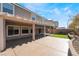 Large covered patio with turf backyard perfect for relaxing and entertaining outdoors at 9883 Russian Hill St, Las Vegas, NV 89141