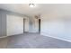 Bedroom with large closet and doorway, neutral paint and carpeting, and a ceiling light at 9883 Russian Hill St, Las Vegas, NV 89141
