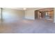 Large living room featuring neutral colored walls and carpet with plenty of space at 9883 Russian Hill St, Las Vegas, NV 89141
