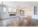 Stylish living room with hardwood floors, recessed lighting, and modern fireplace at 9883 Russian Hill St, Las Vegas, NV 89141