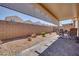 Private patio with ample seating for outdoor relaxation and entertainment at 1000 Via Canale Dr, Henderson, NV 89011