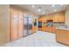 Well-equipped kitchen featuring stainless steel appliances, ample counter space, and custom wood cabinetry at 10037 Summer Oak Ln # 102, Las Vegas, NV 89134