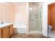 Inside view of the shower room with glass door, rainfall shower head and handheld wand at 10037 Summer Oak Ln # 102, Las Vegas, NV 89134