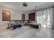 Living room with a sectional sofa and windowed natural lighting at 10454 Gunpowder Falls St, Las Vegas, NV 89183