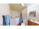 Well-lit bathroom with a step-in tub, an organized vanity and functional bathroom accessories at 1100 Mitchell Pl, Pahrump, NV 89060