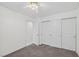 Bedroom with carpet, standard closet doors, and bright white walls at 114 Tamarack Dr, Henderson, NV 89002