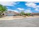 Charming single-story home featuring a well-manicured xeriscaped front yard and attached two-car garage at 114 Tamarack Dr, Henderson, NV 89002