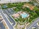 Picturesque overhead view of a recreational area featuring swimming pools, baseball fields, and community facilities for active living at 11695 Gentle Birdsong Ave, Las Vegas, NV 89138