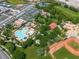 Aerial view of a community park with swimming pool, baseball fields, and playgrounds, ideal for Gathering entertainment at 11695 Gentle Birdsong Ave, Las Vegas, NV 89138