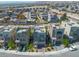 This aerial view reveals modern homes with rooftop patios and well-maintained landscaping at 11695 Gentle Birdsong Ave, Las Vegas, NV 89138
