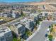 Aerial view showcasing modern homes, scenic mountains, and community layout for tranquil suburban living at 11695 Gentle Birdsong Ave, Las Vegas, NV 89138
