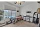 Cozy bedroom with natural light and views of backyard at 11695 Gentle Birdsong Ave, Las Vegas, NV 89138