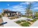 Inviting community area with modern pergola, landscaping, seating, and green space for outdoor enjoyment at 11695 Gentle Birdsong Ave, Las Vegas, NV 89138