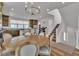 Dining area adjacent to kitchen with a view of the stairway to the second floor at 11695 Gentle Birdsong Ave, Las Vegas, NV 89138
