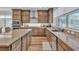 Spacious kitchen with granite countertops, stainless steel appliances, and custom cabinetry at 11695 Gentle Birdsong Ave, Las Vegas, NV 89138
