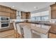 Well-equipped kitchen with stainless steel appliances and granite countertops at 11695 Gentle Birdsong Ave, Las Vegas, NV 89138