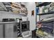 Practical laundry room with newer washer and dryer with lots of storage at 11695 Gentle Birdsong Ave, Las Vegas, NV 89138