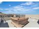 Rooftop deck with comfortable lounge seating and mountain views at 11695 Gentle Birdsong Ave, Las Vegas, NV 89138