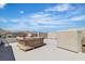 Rooftop deck with comfortable lounge seating and mountain views at 11695 Gentle Birdsong Ave, Las Vegas, NV 89138