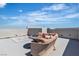 Rooftop deck with comfortable lounge seating and mountain views at 11695 Gentle Birdsong Ave, Las Vegas, NV 89138