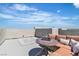 Rooftop deck with comfortable lounge seating and mountain views at 11695 Gentle Birdsong Ave, Las Vegas, NV 89138