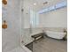 Luxurious bathroom featuring a soaking tub and separate glass shower at 11906 Port Labelle Dr, Las Vegas, NV 89141