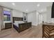 Serene bedroom with hardwood floors, and large windows, creating a comfortable and inviting atmosphere at 11906 Port Labelle Dr, Las Vegas, NV 89141