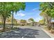 Elegant gated community entrance with manicured landscaping that provides a secure and welcoming entry at 11906 Port Labelle Dr, Las Vegas, NV 89141